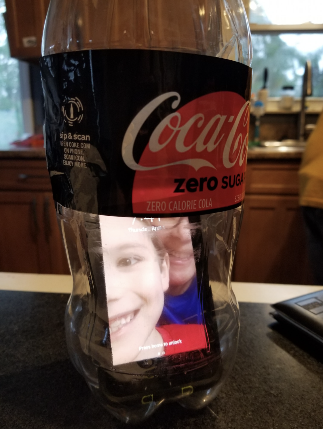2-liter with cell phone inside April Fools Day prank
